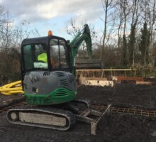 Digger lifting soil
