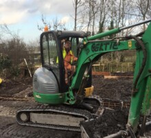 Digger lifting soil