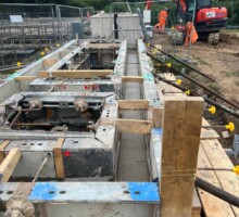 Concrete curing process with moisture control